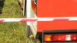 Warning tape fencing against fire engine  