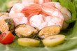 Photo: Tasty mussels and prawn food with salad and olives Tasty mussels and prawn food with salad and olives