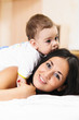 mother and son are playing