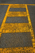 Old Asphalt and Yellow Lines