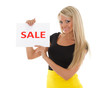 Young  woman with sale sign.