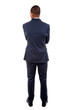 Photo: Young business man from the back over a white background Young business man from the back over a white background