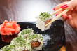 sushi with chopsticks