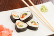 Photo: sushi with chopsticks sushi with chopsticks