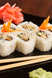 Photo: sushi with chopsticks sushi with chopsticks