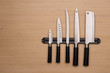Set of knives on a magnetic holder