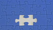 building a jigsaw of blue pieces - Demontage