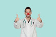 Foto: Doctor with a clown nose saying Ok Doctor with a clown nose saying Ok