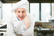 Portrait of a smiling chef in his kitchen