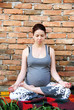 Pregnant woman doing yoga