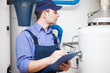 Photo: Hot-water heater service Hot-water heater service