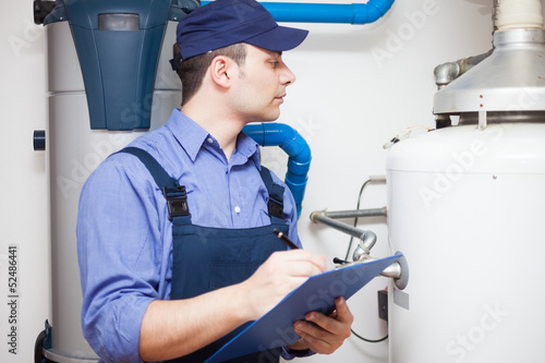Photo: Hot-water heater service Hot-water heater service