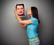 woman kissing the photo of depressed man