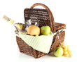 Picnic basket with fruits and bottle of wine, isolated on white