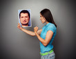woman showing threatening fist to man