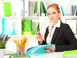 Portrait of teacher woman working in classroom