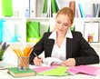 Portrait of teacher woman working in classroom