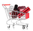 Cosmetics in cart isolated on white