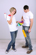 Young couple doing renovation together.
