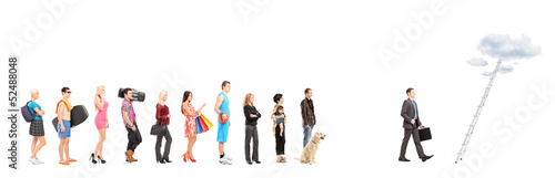 Photo: Full length portraits of people waiting in a line and a busines Full length portraits of people waiting in a line and a busines