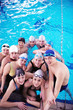 Photo: happy teen group at swimming pool happy teen group at swimming pool