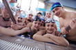 Photo: happy teen group at swimming pool happy teen group at swimming pool