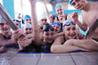 Photo: happy teen group at swimming pool happy teen group at swimming pool