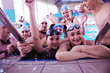 Photo: happy teen group at swimming pool happy teen group at swimming pool