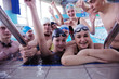 Photo: happy teen group at swimming pool happy teen group at swimming pool