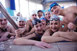 happy teen group  at swimming pool