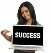 Young woman holding laptop with success