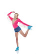 Smiling slender blonde posing in sports wear