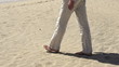 Man walking on the beach, super slow motion, shot at 240fps