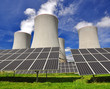 Photo: Solar energy panels before a nuclear power plant Solar energy panels before a nuclear power plant