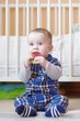 baby with teething toy