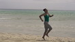 Happy woman jumping on the beach, super slow motion