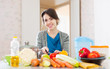 woman cooking vegetarian food