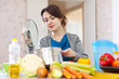 woman cooking vegetarian lunch