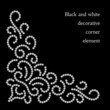 Dotted swirls, black and white corner pattern