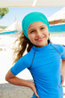 Summer vacation, summer joy - lovely surfer girl in the beach