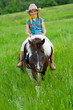 Foto: Horse and lovely equestrian girl. Horse and lovely equestrian girl.