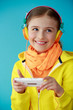 Cute young girl enjoying music
