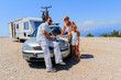 Travel - family with camping car on the road