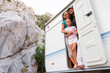 Foto: Holiday travel - family in caravan on camping Holiday travel - family in caravan on camping