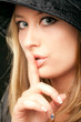 woman shush sign