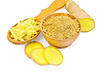 Ginger powder and grated in a wooden dishes