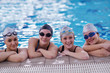 happy teen group  at swimming pool