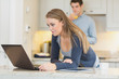 Young woman using laptop