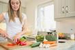 Woman cutting vegetables