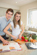 Happy couple cooking together